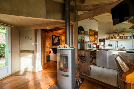 Immobilier Rouffignac - séjour et cuisine du gite "L'ermitage"