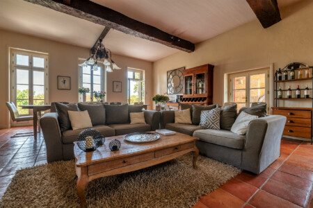 Immobilier Le Fleix 19 Immobilier Le Fleix - Le coin salon de la pièce à vivre